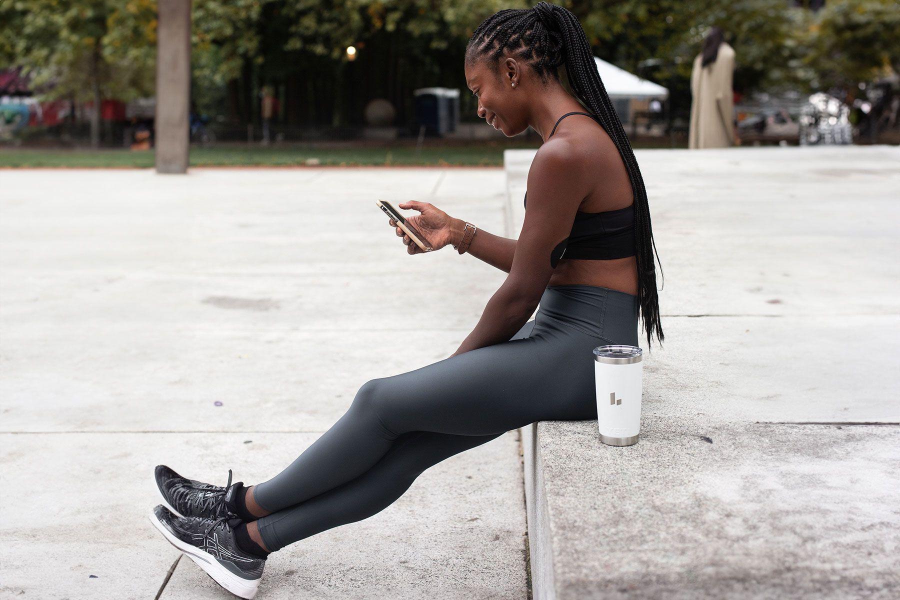 Woman on her phone in a park